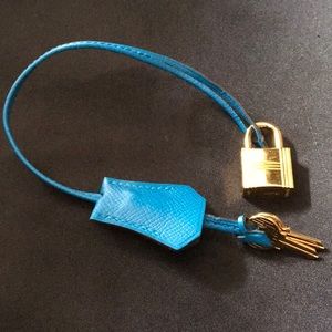 Authentic Hermès  Goldlock and 2 gold keys